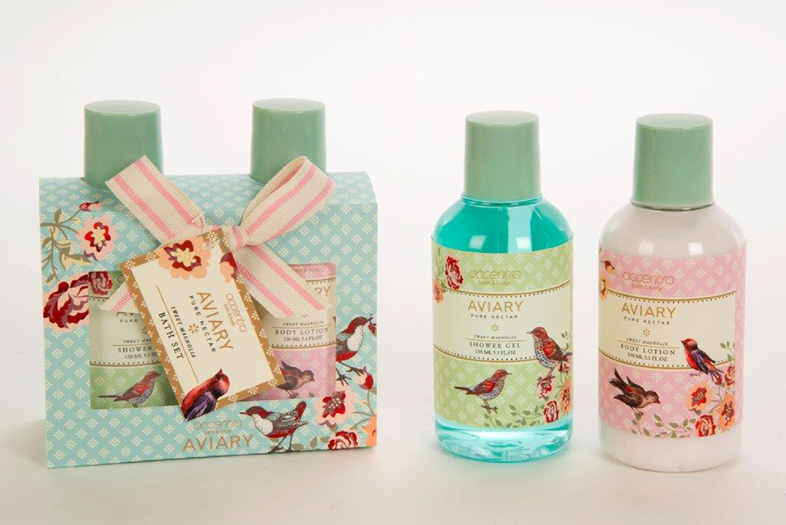 Earlier ACCENTRA® Aviary Pure Nectar gift set with Sweet Magnolia shower gel, body lotion, blue floral packaging, and illustrated birds