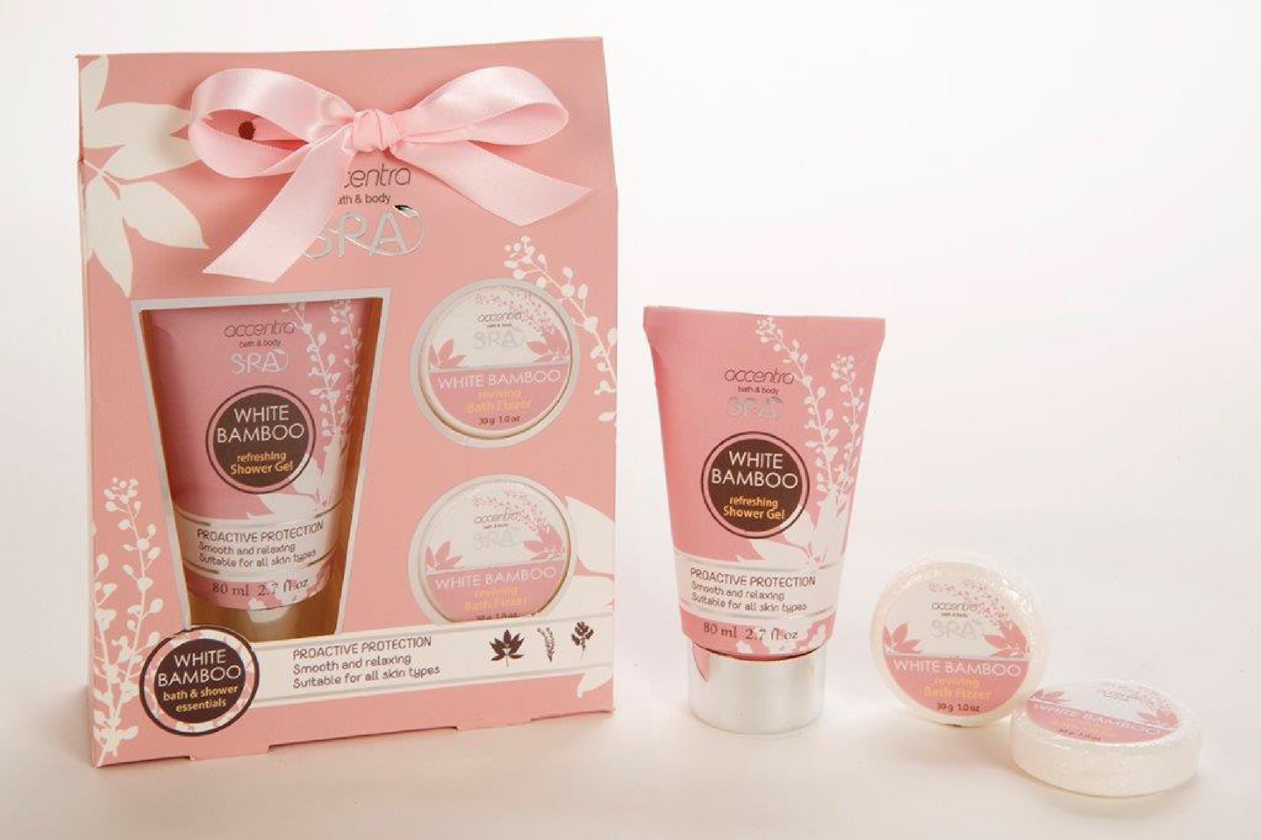 Earlier ACCENTRA® White Bamboo Bath & Body gift set with shower gel, bath fizzers, pink botanical packaging, and ribbon detail